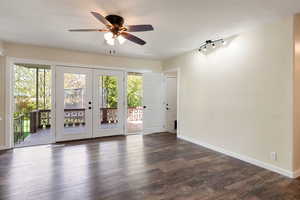 Dining area with baseboards, ceiling fan, and french doors