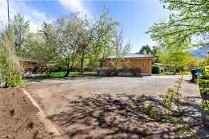 View of yard featuring fence