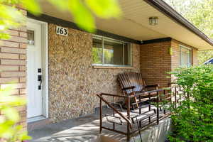 View of patio featuring covered porch