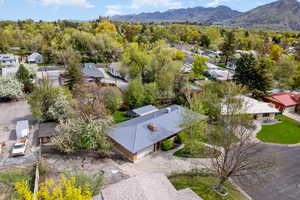 Birds eye view of property featuring a residential view and a mountain view