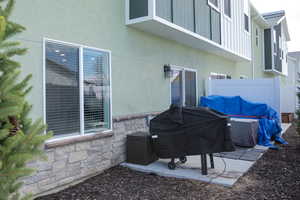 View of patio / terrace with area for grilling and fence