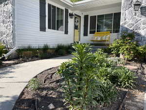 Property entrance featuring a porch