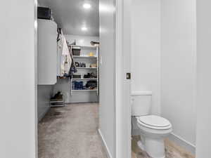 Walk in closet in the primary bedroom suite