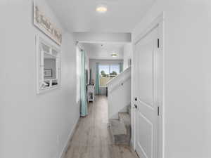 Large entry with wood-look hardwood floors and extra windows since this is an end unit.