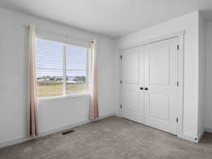 One of three upstairs bedrooms