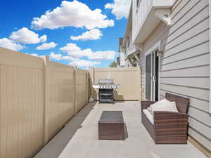 Private patio area with zero maintenance and plenty of room for outdoor entertaining.