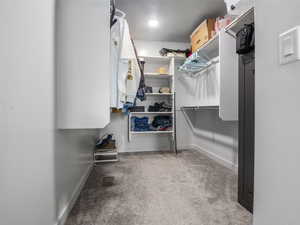 Walk-in closet in the primary bedroom suite
