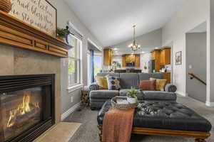 Soaring vaulted ceilings extend from the great room to the kitchen