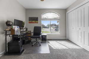 One of three main level bedrooms with neutral fresh paint and newer carpet