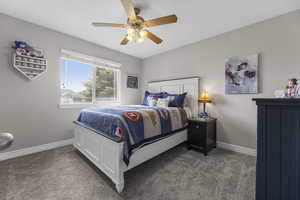 One of three main level bedrooms with neutral fresh paint and newer carpet