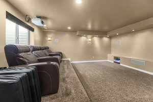 Spacious theater room with stadium seating