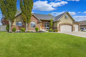 Nestled in a quiet cul-de-sac with lush landscaping, full fencing & 4 car garage
