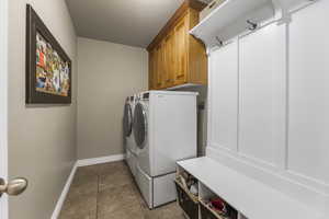 Laundry room/mudroom with built in coat and shoe storage