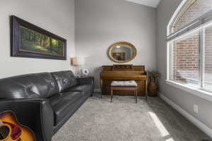 Formal living room with newer carpet & paint