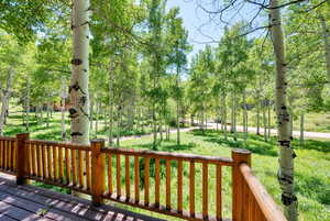 Deck with view of scattered trees
