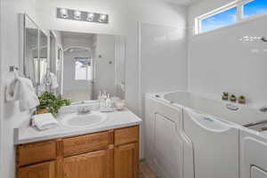 Primary bathroom with walk-in jetted tub