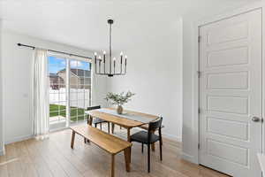 Sliding glass door to backyard with grids.