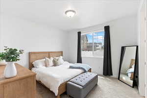 Bright and airy primary bedroom.