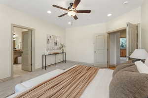 Bedroom with recessed lighting, baseboards, and light carpet