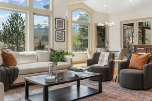 Great Room  with an inviting chandelier and a mountain view