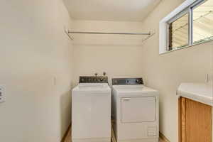 Laundry room with washer and dryer