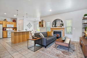 Great Room with gas fireplace, recessed lighting throughout.