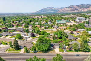 Aerial view of residential area featuring a mountain backdrop