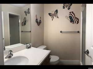 Bathroom featuring vanity and toilet and shower