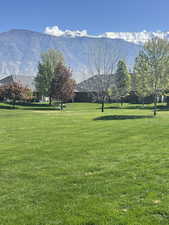 Large Grassy Greenbelt with benches to sit and enjoy the beautiful mountain views