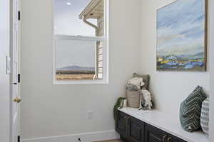 Interior space featuring baseboards and plenty of natural light