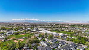 Birds eye view of property featuring a mountain view and a residential view