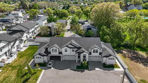 Birds eye view of property with a residential view