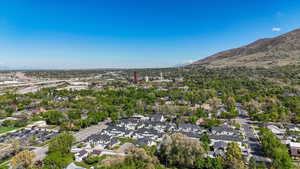 Birds eye view of property featuring a residential view and a mountain view