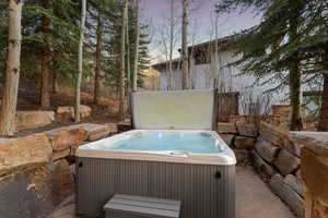 Exterior space with a hot tub