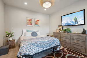 Bedroom with recessed lighting and carpet