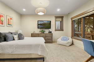 Bedroom with baseboards, recessed lighting, and carpet
