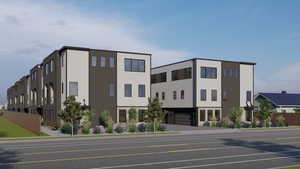 View of building exterior with fence