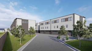 Exterior space featuring a garage and driveway