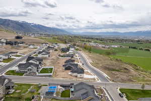 Bird's eye view with a water and mountain view and a residential view