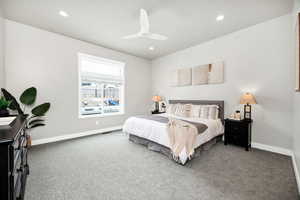 Bedroom with carpet flooring, ceiling fan, recessed lighting, baseboards, and visible vents