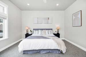 Bedroom with carpet floors, recessed lighting, and baseboards