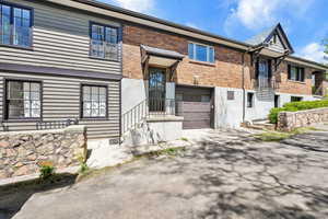 South side of home, entrance to attached garage