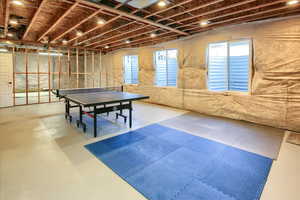 Playroom with concrete flooring