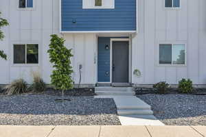 Entrance to property with board and batten siding