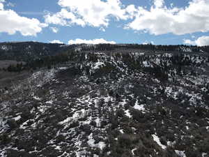 Snowy landscape featuring a mountain view