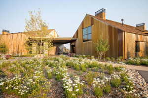 View of front of house featuring a chimney