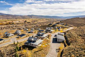 Aerial view featuring a mountain view and a residential view