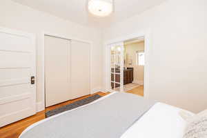 Primary bedroom with closet and ensuite bath