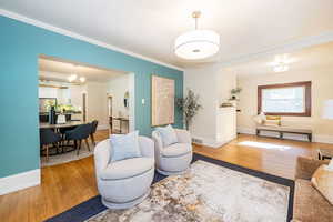 Living room opens to dining room and entryway.