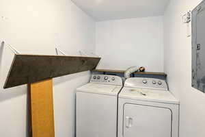 Laundry area with laundry area and independent washer and dryer